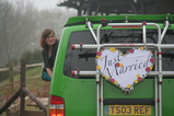 IMG_7324 Jenni leaning out van with Just Married sign.JPG